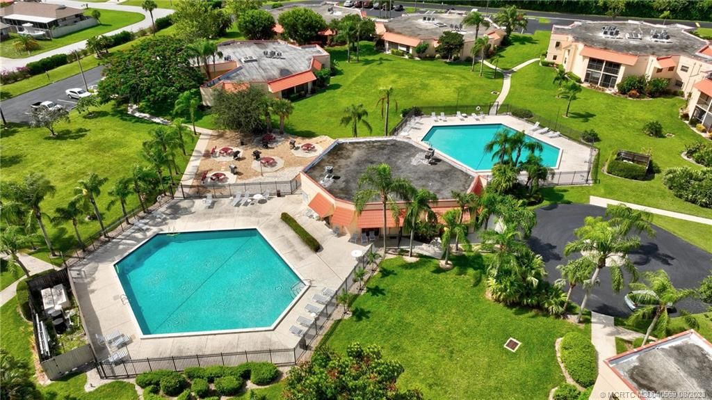 Photo of 2083 NE Collins Circle #100, Jensen Beach, FL 34957 (MLS # M20040569)