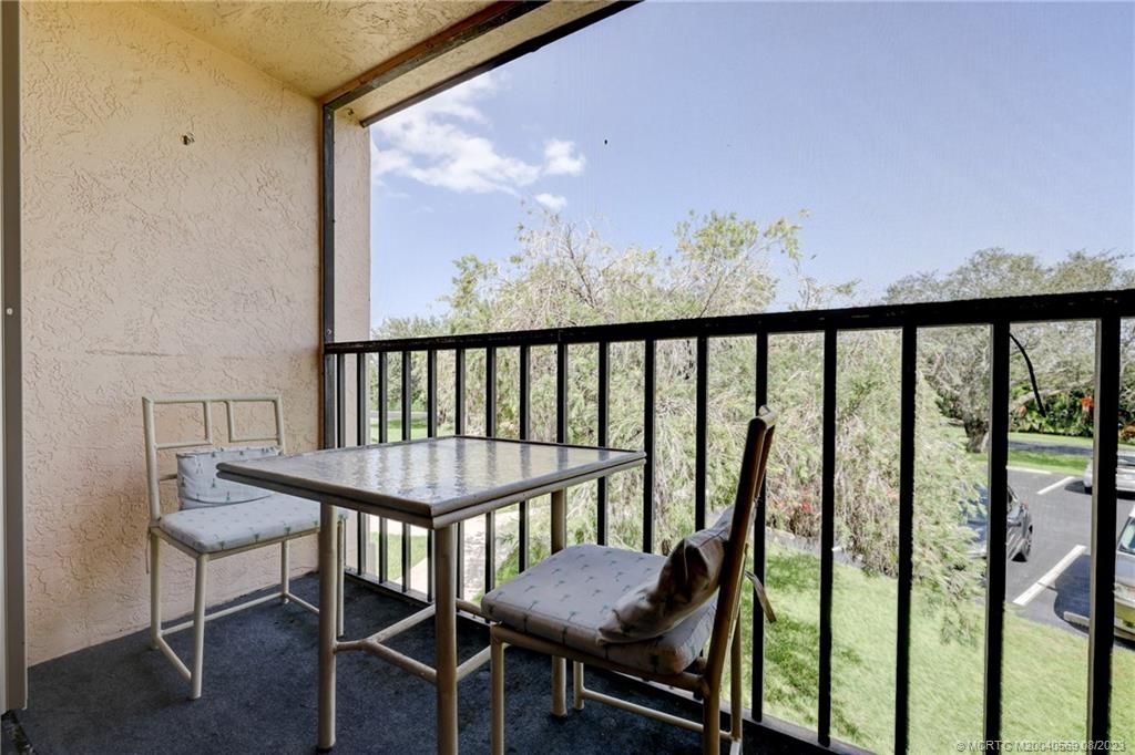 Photo of 2083 NE Collins Circle #100, Jensen Beach, FL 34957 (MLS # M20040569)