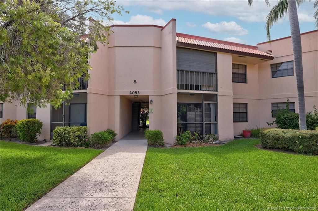 Photo of 2083 NE Collins Circle #100, Jensen Beach, FL 34957 (MLS # M20040569)