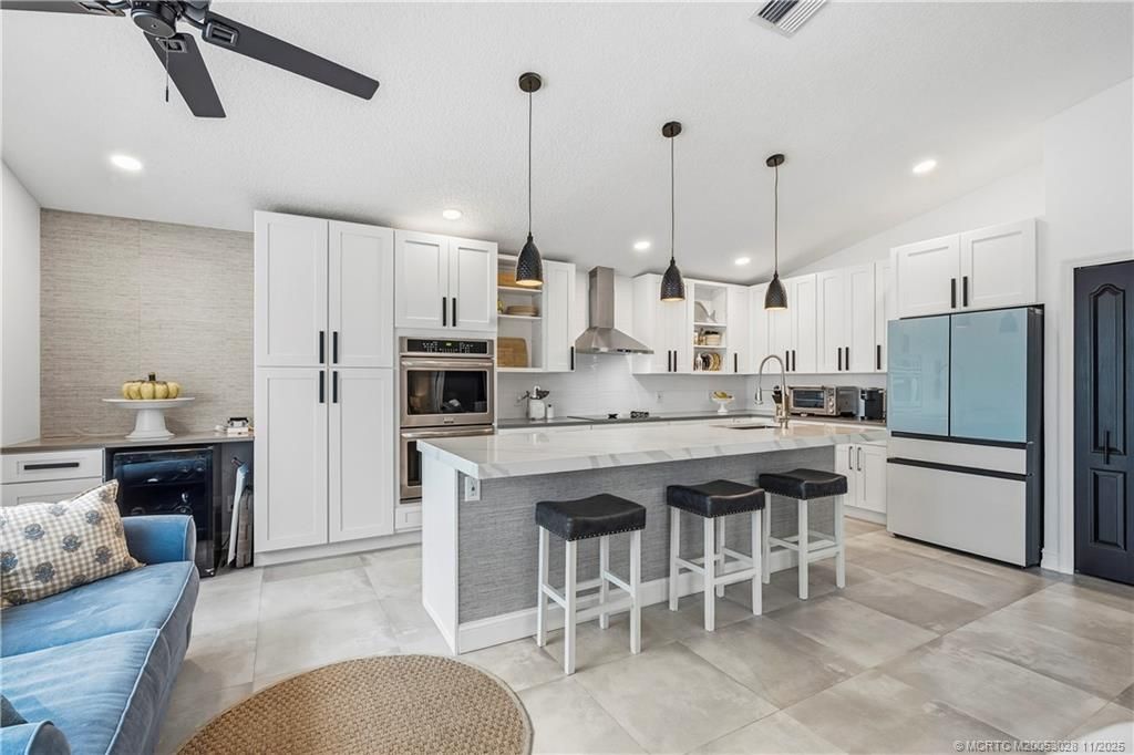 Photo of 323 NW Emilia Way, Jensen Beach, FL 34957 (MLS # M20053028)