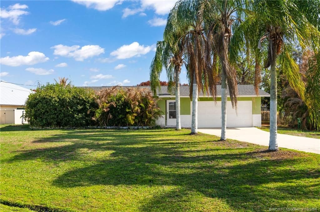 Photo of 598 SW Lakehurst Drive, Port Saint Lucie, FL 34983 (MLS # M20054812)