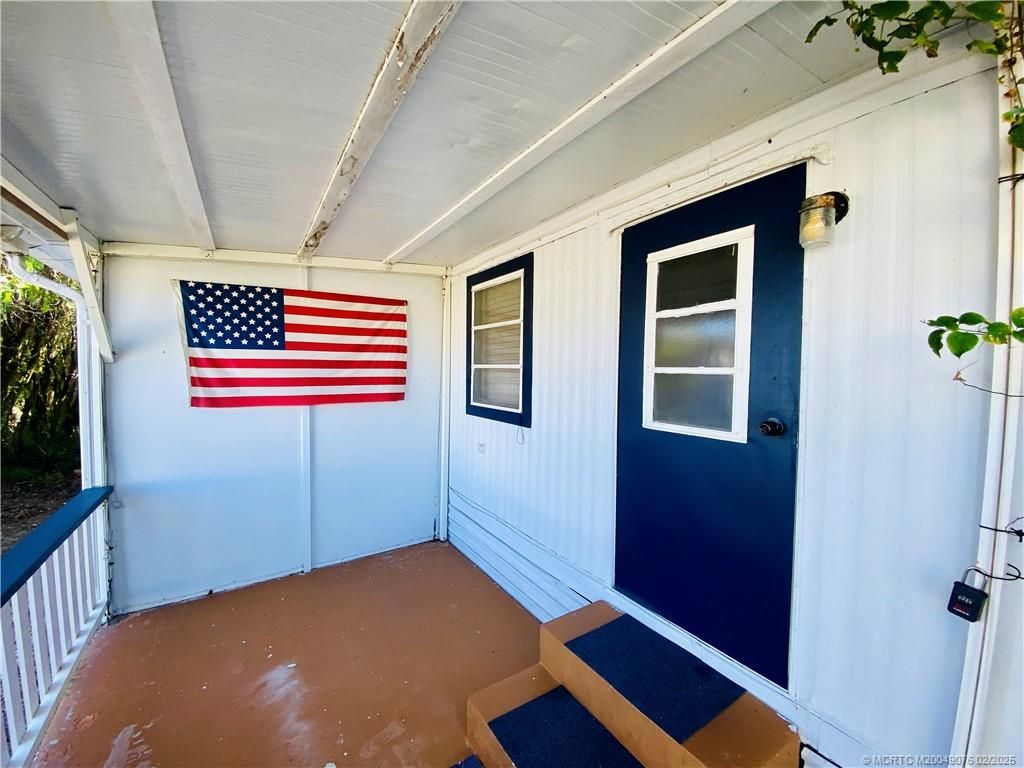 Photo of 321 NE Tropicalia Lane, Jensen Beach, FL 34957 (MLS # M20049076)