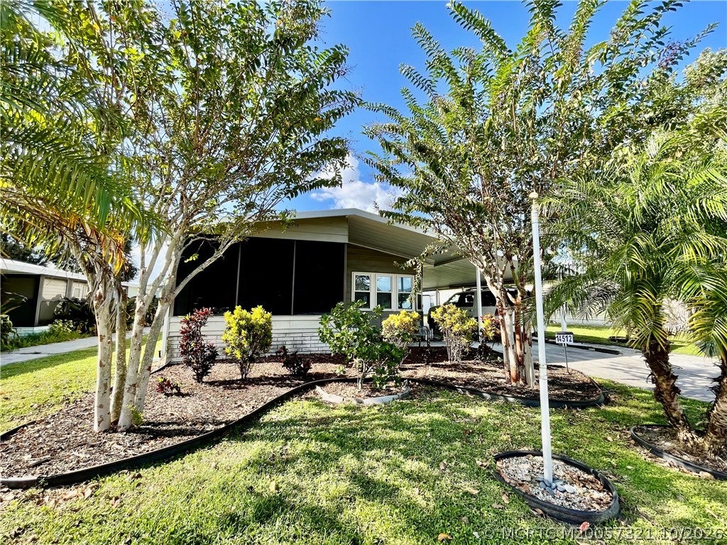 Photo of 14512 SW Divot Drive, Indiantown, FL 34956 (MLS # M20057321)