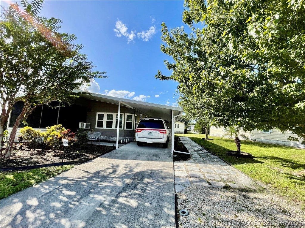 Photo of 14512 SW Divot Drive, Indiantown, FL 34956 (MLS # M20057321)