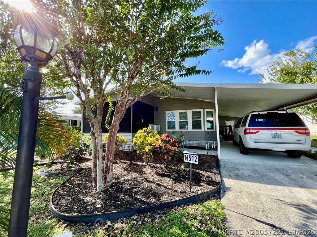 Photo of 14512 SW Divot Drive, Indiantown, FL 34956 (MLS # M20057321)