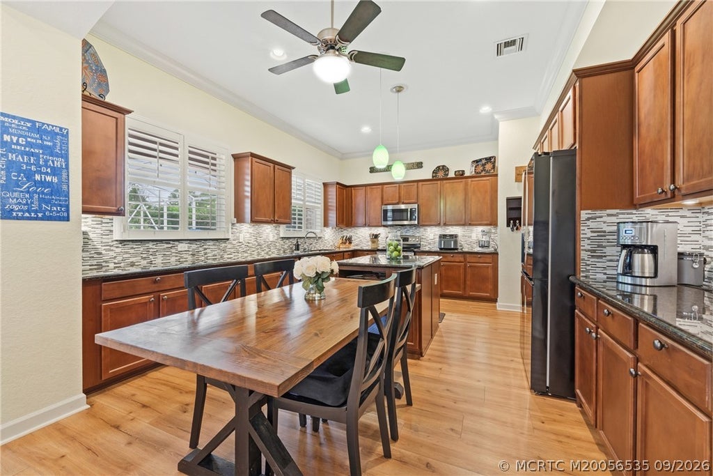 Photo of 5541 SW Bellflower Court, Palm City, FL 34990 (MLS # M20056535)