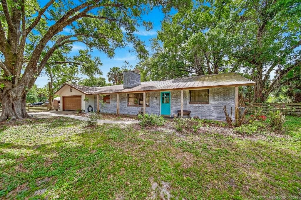 Photo of 6260 SW Markel Street, Palm City, FL 34990 (MLS # M20055080)