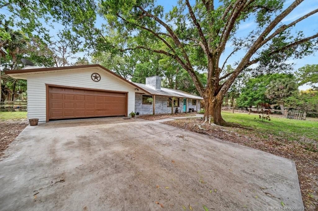 Photo of 6260 SW Markel Street, Palm City, FL 34990 (MLS # M20055080)