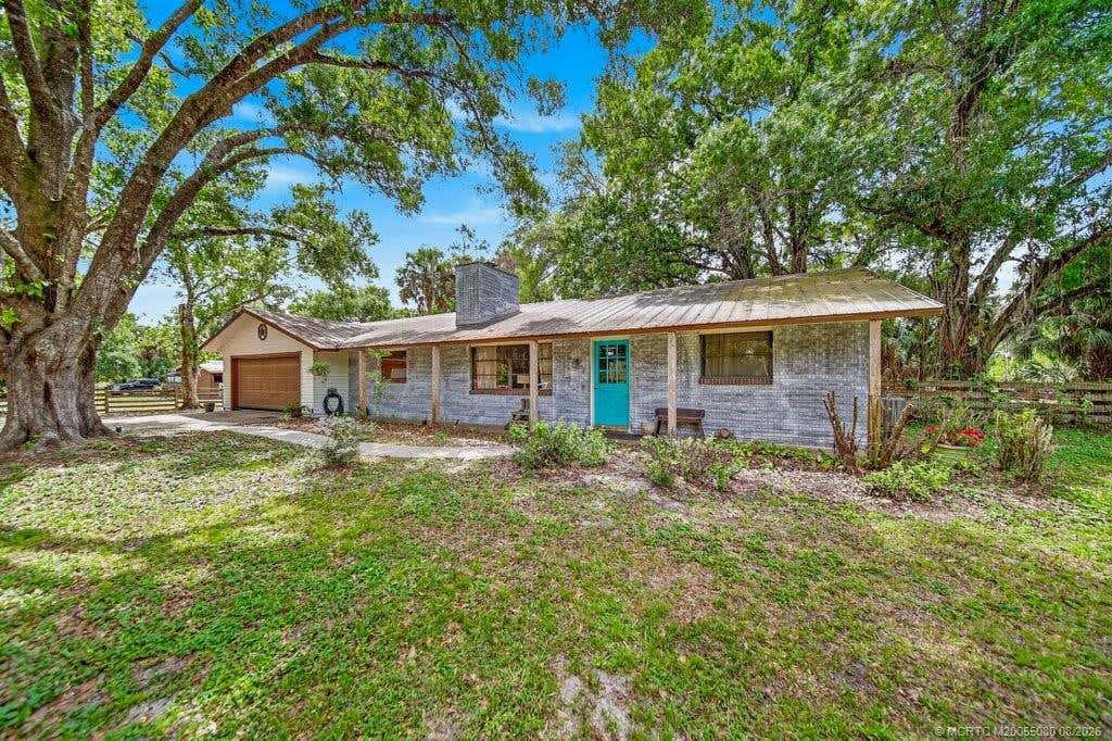 Photo of 6260 SW Markel Street, Palm City, FL 34990 (MLS # M20055080)