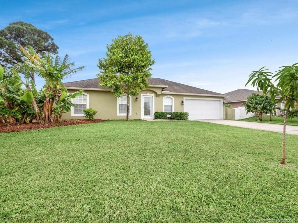 Photo of 209 SW Tulip Boulevard, Port Saint Lucie, FL 34953 (MLS # M20049043)