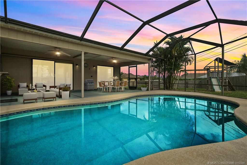 Photo of 702 SW Jacoby Avenue, Port Saint Lucie, FL 34953 (MLS # M20043090)