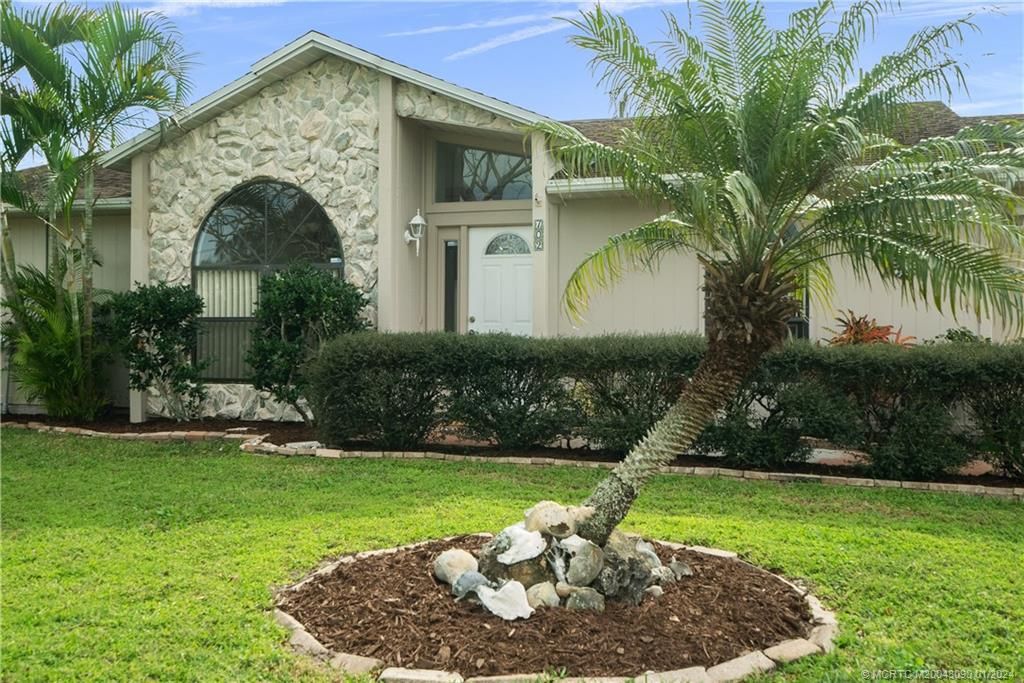 Photo of 702 SW Jacoby Avenue, Port Saint Lucie, FL 34953 (MLS # M20043090)