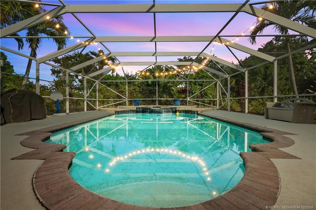 Photo of 2457 SE Issac Road, Port Saint Lucie, FL 34952 (MLS # M20043534)