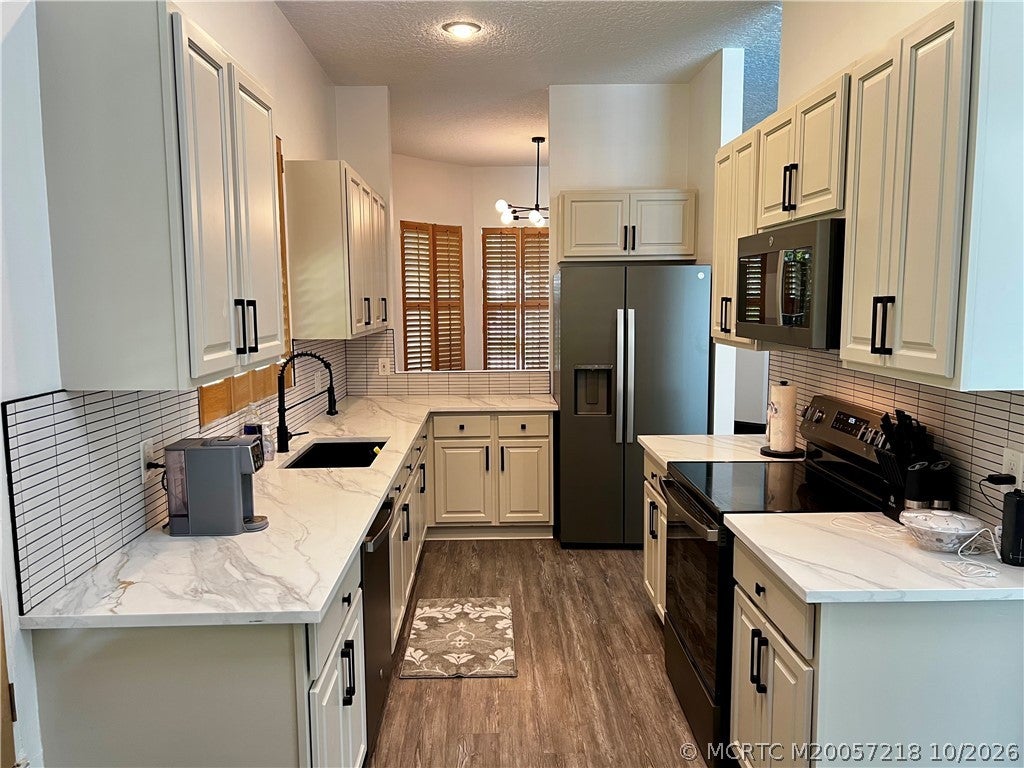 Photo of 406 SW Fairway Landing, Port Saint Lucie, FL 34986 (MLS # M20057218)