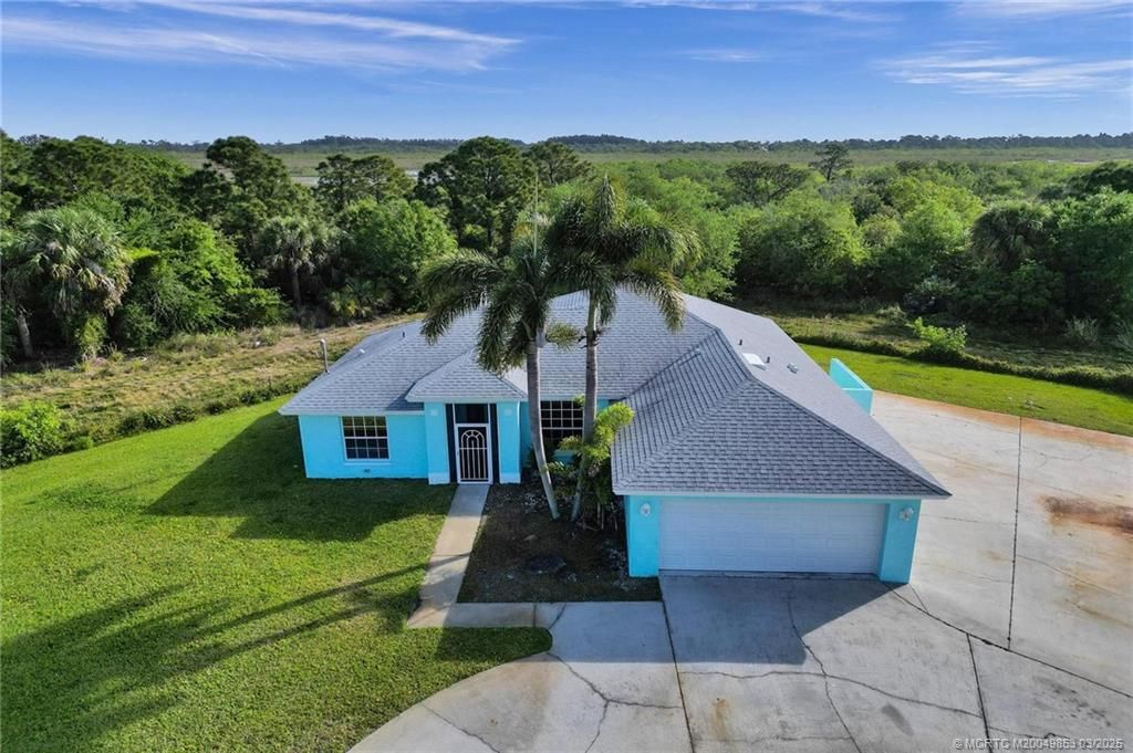 Photo of 5902 Yucca Drive Dr, Fort Pierce, FL 34982 (MLS # M20049853)