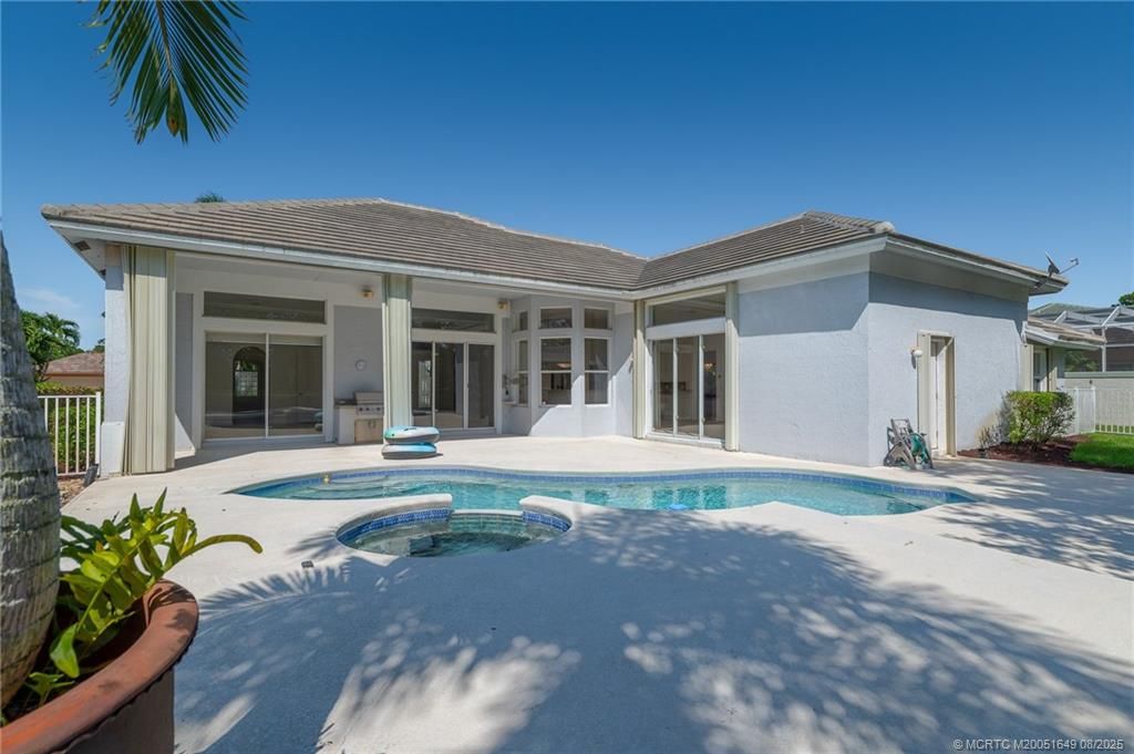 Photo of 5204 SW Hammock Creek Drive, Palm City, FL 34990 (MLS # M20051649)