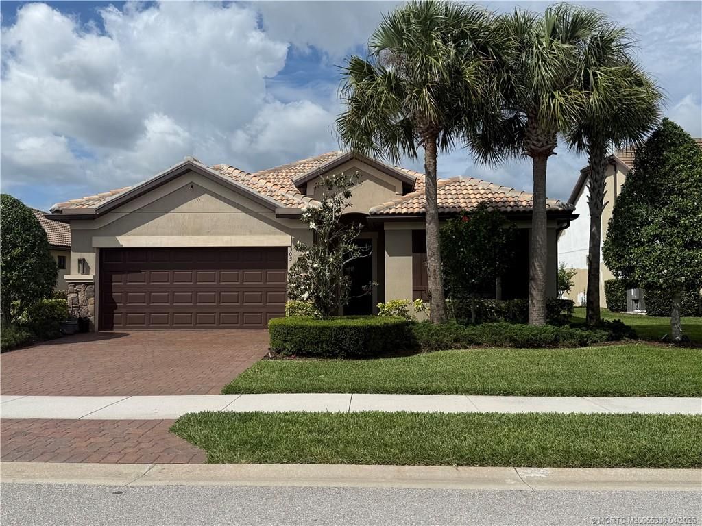 Photo of 303 SE Courances Drive, Port Saint Lucie, FL 34984 (MLS # M20055336)