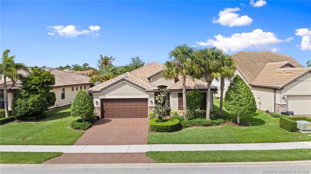 Photo of 303 SE Courances Drive, Port Saint Lucie, FL 34984 (MLS # M20055336)