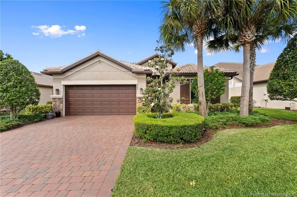 Photo of 303 SE Courances Drive, Port Saint Lucie, FL 34984 (MLS # M20055336)