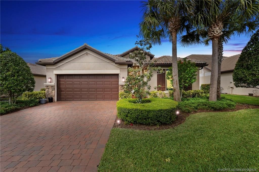 Photo of 303 SE Courances Drive, Port Saint Lucie, FL 34984 (MLS # M20055336)