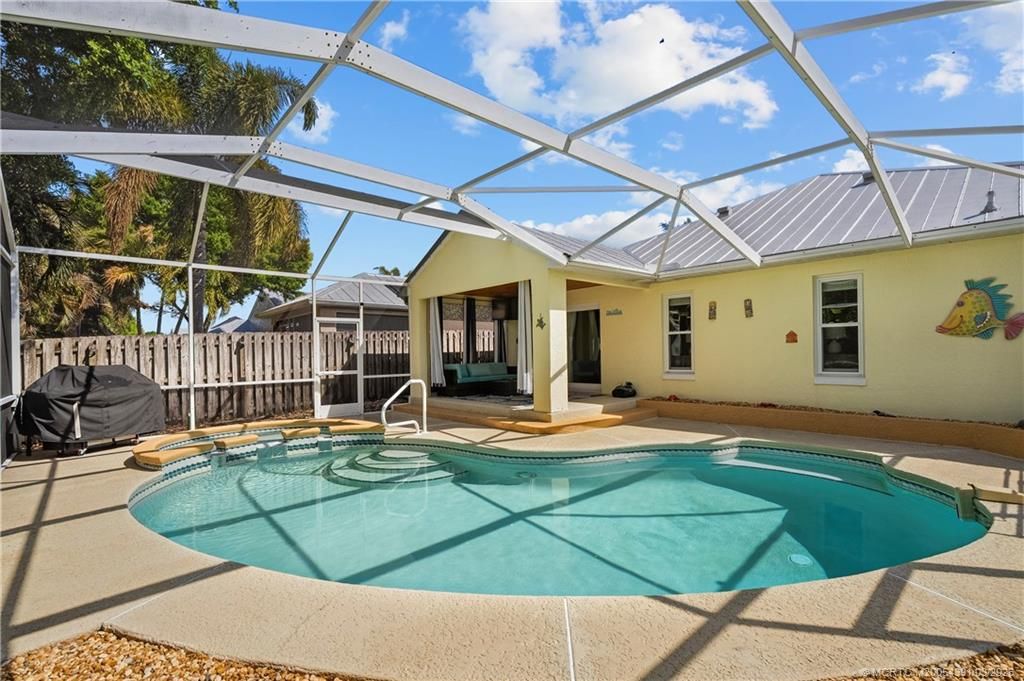 Photo of 820 NW Waterlily Place, Jensen Beach, FL 34957 (MLS # M20054391)