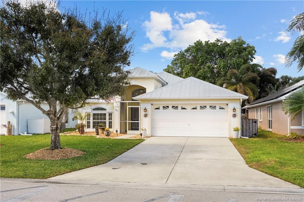 Photo of 820 NW Waterlily Place, Jensen Beach, FL 34957 (MLS # M20054391)