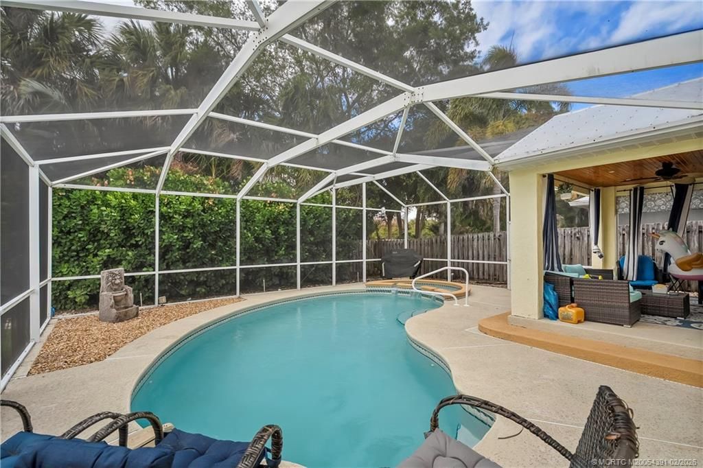 Photo of 820 NW Waterlily Place, Jensen Beach, FL 34957 (MLS # M20054391)