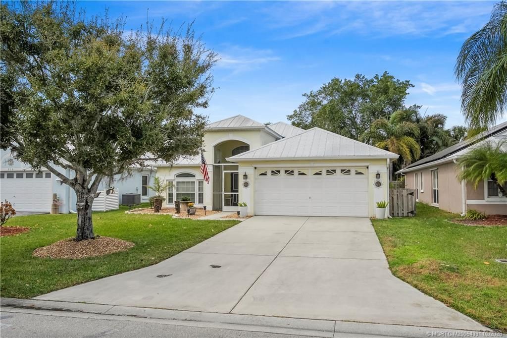 Photo of 820 NW Waterlily Place, Jensen Beach, FL 34957 (MLS # M20054391)
