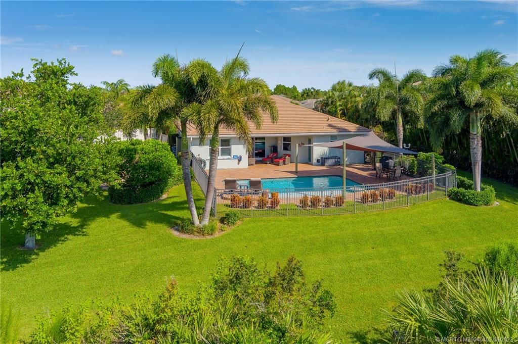 Photo of 471 NW Windflower Terrace, Jensen Beach, FL 34957 (MLS # M20040402)