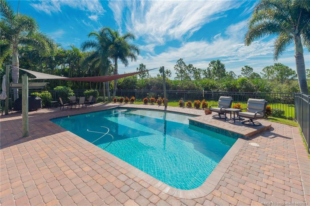 Photo of 471 NW Windflower Terrace, Jensen Beach, FL 34957 (MLS # M20040402)