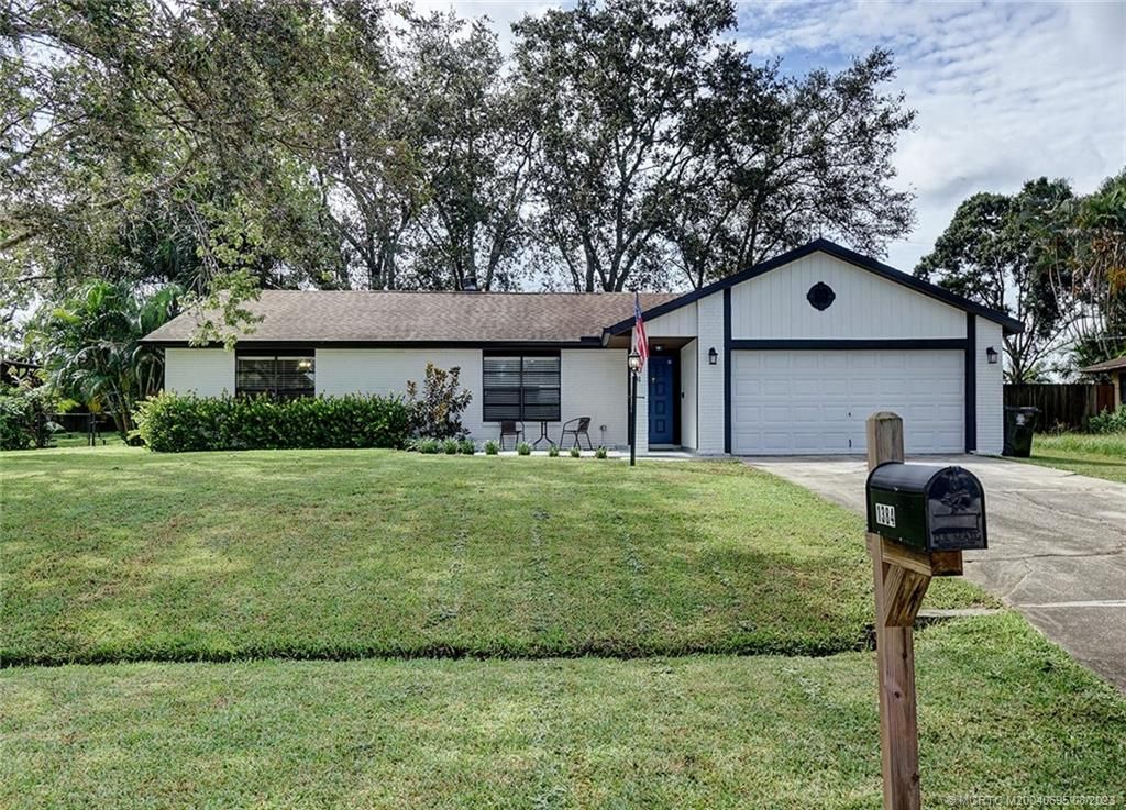 Photo of 1384 SW Axtell Avenue, Port Saint Lucie, FL 34953 (MLS # M20040695)