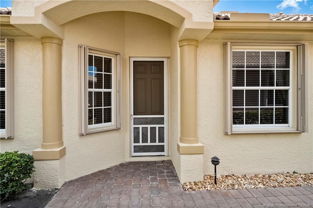 Photo of 871 NW Red Pine Way, Jensen Beach, FL 34957 (MLS # M20050609)