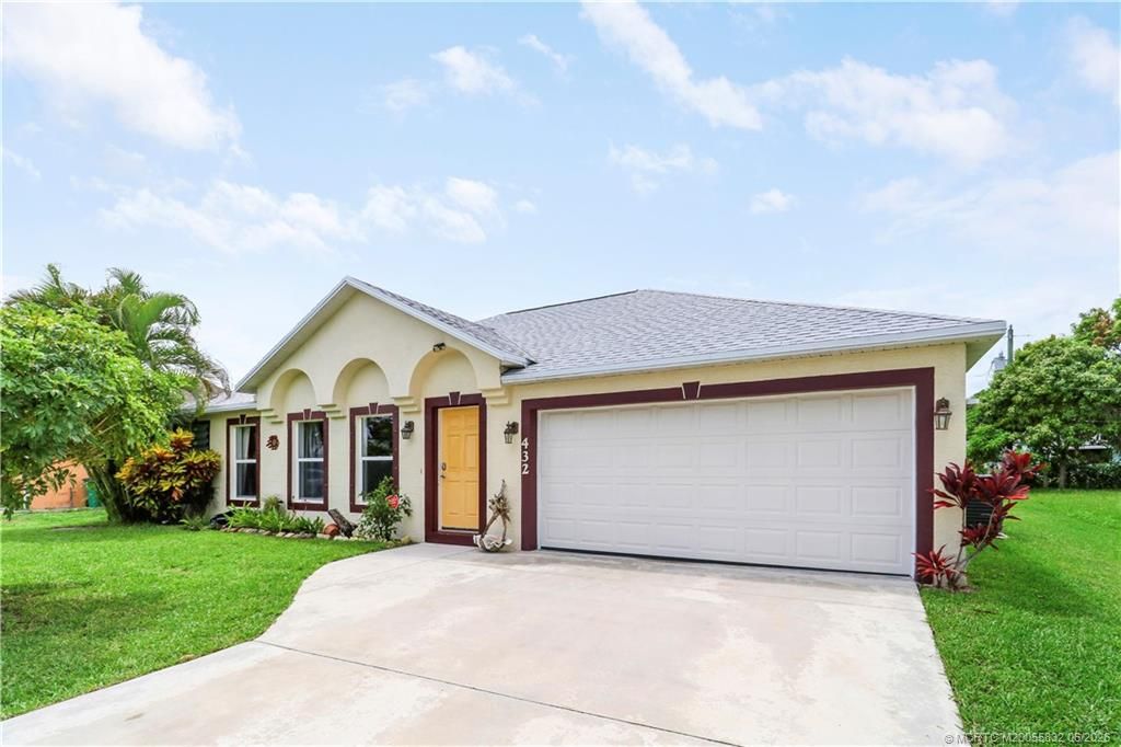 Photo of 432 NW Raymond Lane, Port Saint Lucie, FL 34983 (MLS # M20055832)