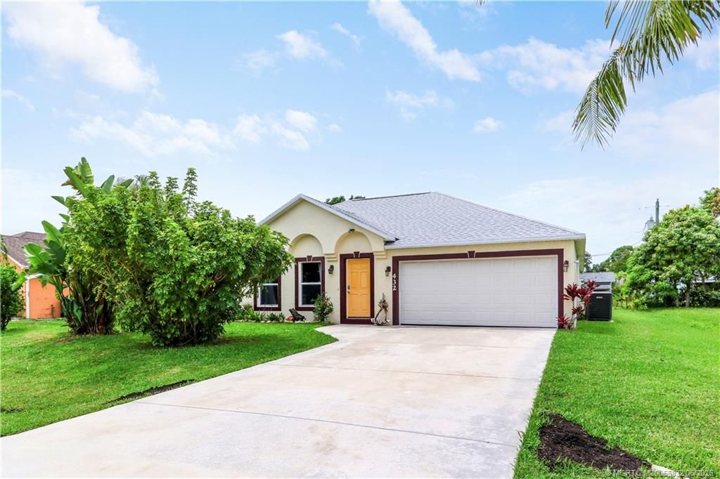Photo of 432 NW Raymond Lane, Port Saint Lucie, FL 34983 (MLS # M20055832)