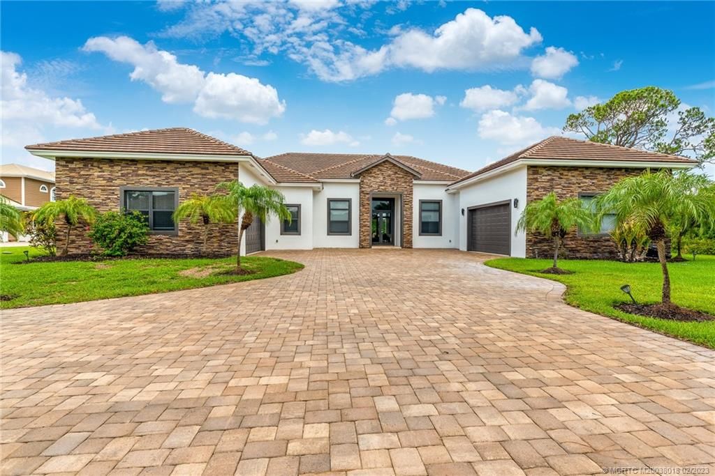 Photo of 10207 SW Stones Throw Terrace, Palm City, FL 34990 (MLS # M20038018)