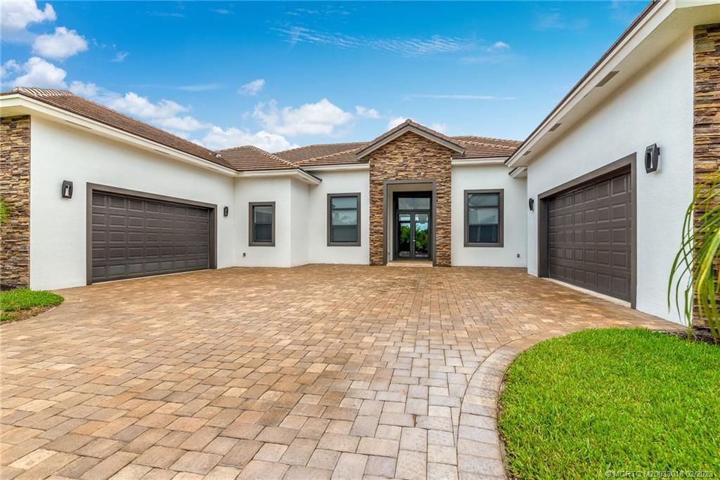 Photo of 10207 SW Stones Throw Terrace, Palm City, FL 34990 (MLS # M20038018)