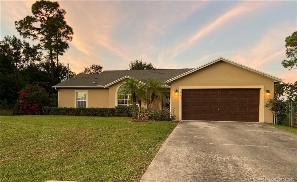 Photo of 1069 SW Jacqueline Avenue, Port Saint Lucie, FL 34953 (MLS # M20052098)