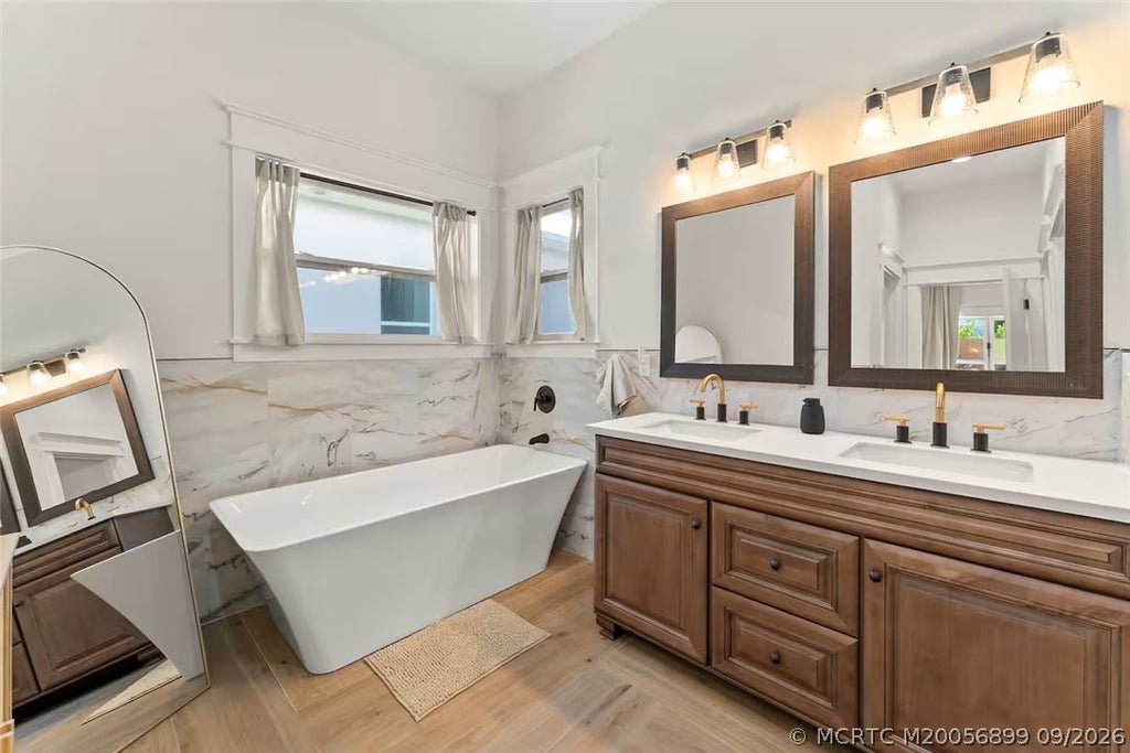 Photo of 1920 NE Dixie Highway, Jensen Beach, FL 34957 (MLS # M20056899)