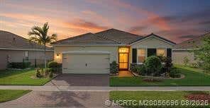 Photo of 10568 SW Cambria Lane, Port Saint Lucie, FL 34987 (MLS # M20056696)