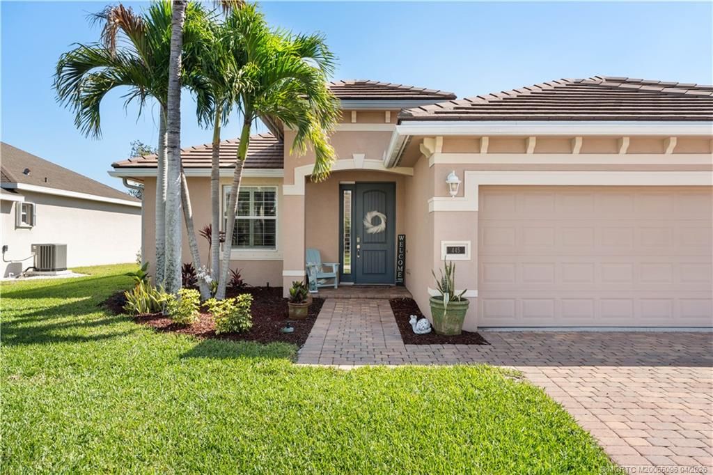 Photo of 445 NW Sunflower Place, Jensen Beach, FL 34957 (MLS # M20055096)