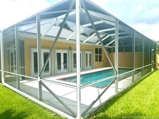 Photo of 2699 SW Prospect Place, Palm City, FL 34990 (MLS # M20056345)