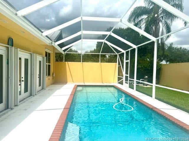 Photo of 2699 SW Prospect Place, Palm City, FL 34990 (MLS # M20056345)