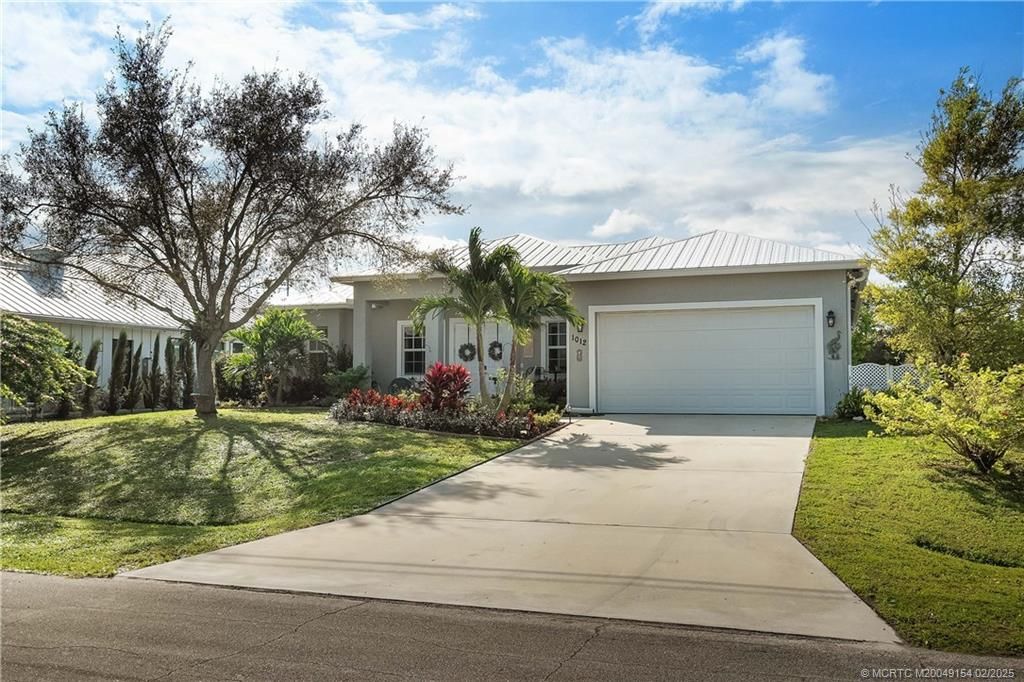 Photo of 1012 SW Abbot Avenue, Port Saint Lucie, FL 34953 (MLS # M20049154)