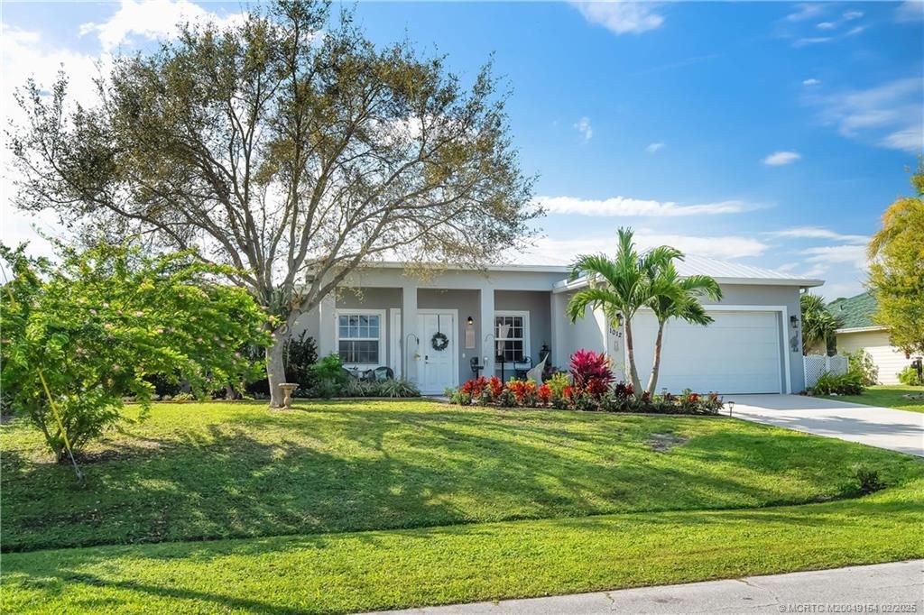 Photo of 1012 SW Abbot Avenue, Port Saint Lucie, FL 34953 (MLS # M20049154)