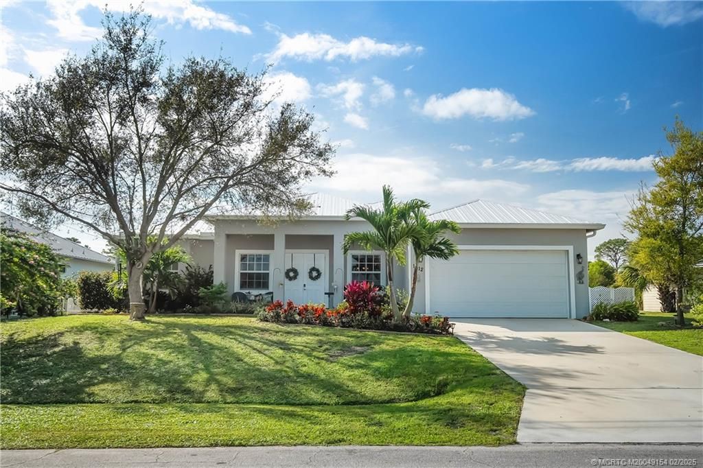 Photo of 1012 SW Abbot Avenue, Port Saint Lucie, FL 34953 (MLS # M20049154)