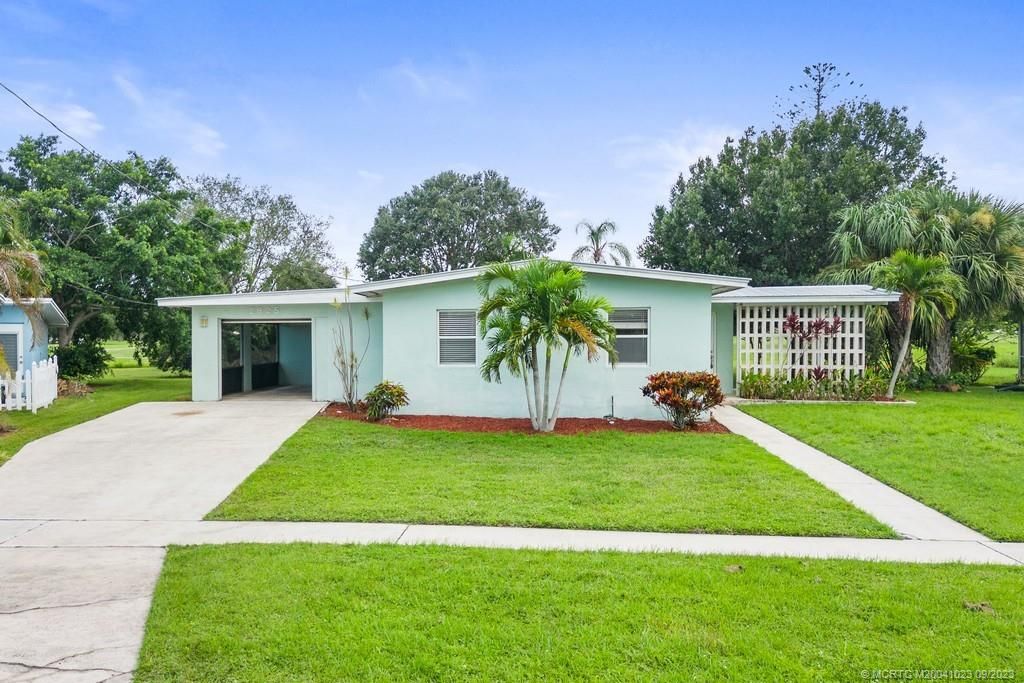 Photo of 2825 SE Pocatella Road, Port Saint Lucie, FL 34952 (MLS # M20041023)