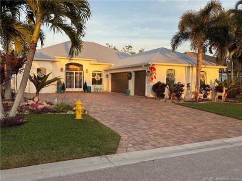 Photo of 443 NW Sunflower Place, Jensen Beach, FL 34957 (MLS # M20053401)