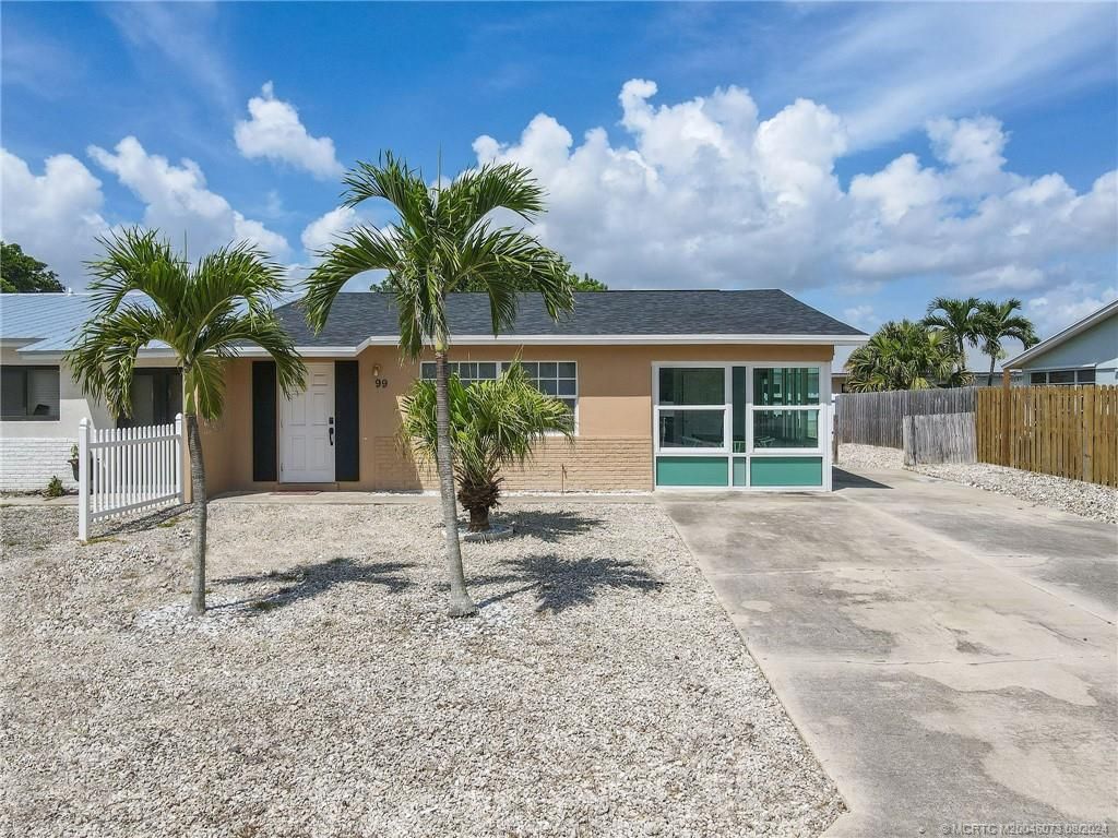 Photo of 99 S Las Olas Drive, Jensen Beach, FL 34957 (MLS # M20046073)