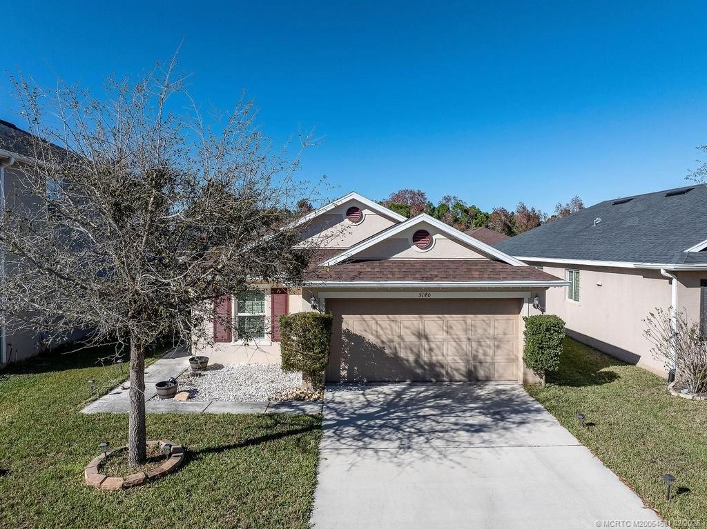 Photo of 5140 NW Pine Trail Circle, Port Saint Lucie, FL 34983 (MLS # M20054531)