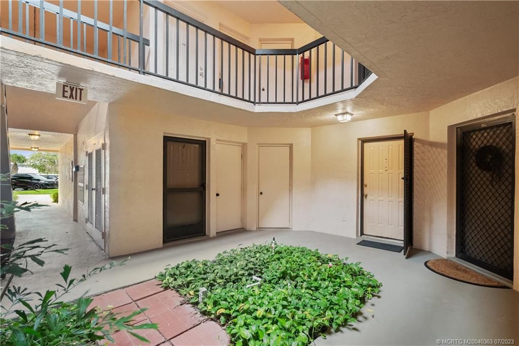 Photo of 2069 NE Collins Circle #7-50, Jensen Beach, FL 34957 (MLS # M20040363)